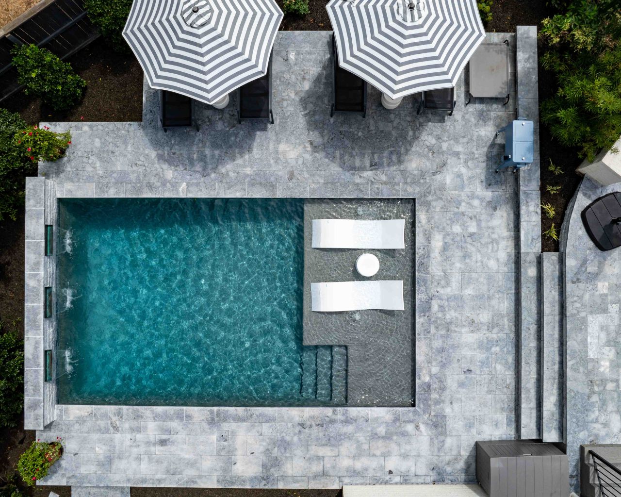 an aerial view of a custom built swimming pool in North Carolina